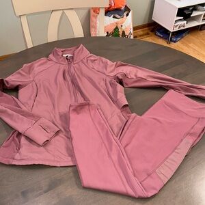 Pink jacket and yoga pants